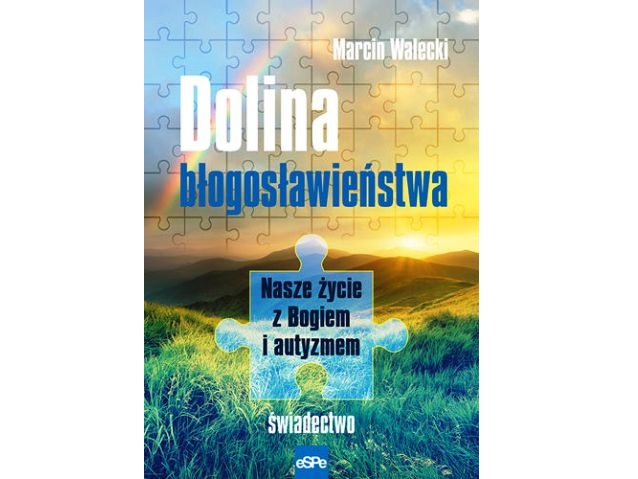 Okładka książki Dolina błogosławieństwa: widok gór przy zachodzącym słońcu i tęczy